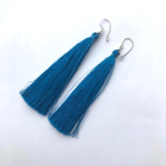 Hippakorut, turkoosit tupsukorvakorut